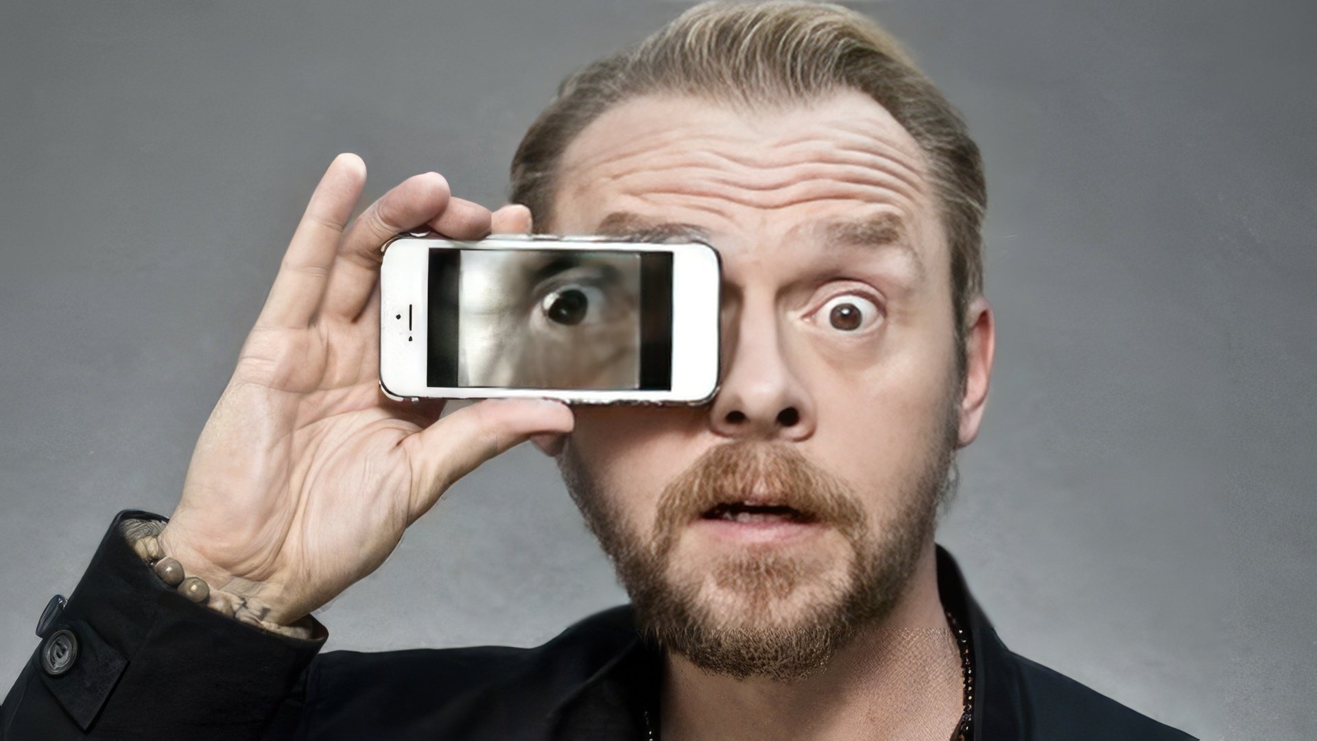 Comediant, scenarist și actor britanic Simon Pegg