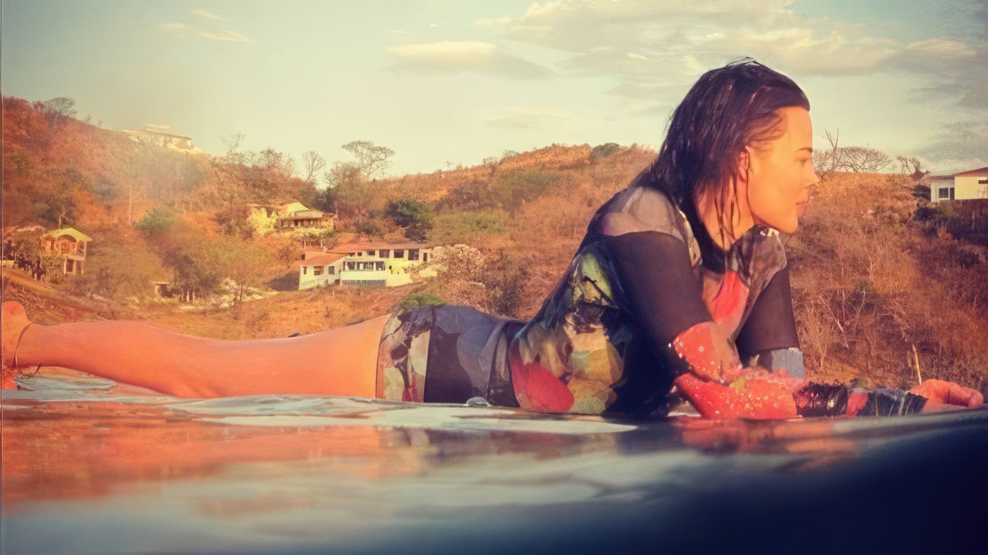 Ca o adevărată australiancă, Margot Robbie iubește surfingul