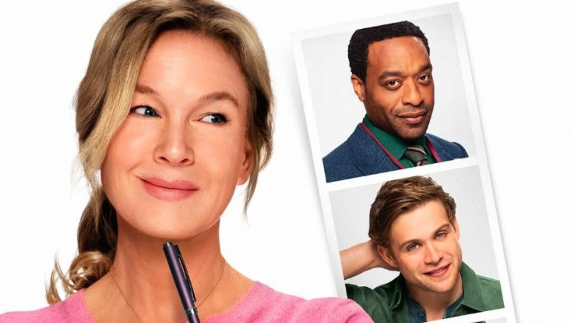 Actrița Renée Zellweger într-o bluză roz se uită la fotografiile a doi bărbați