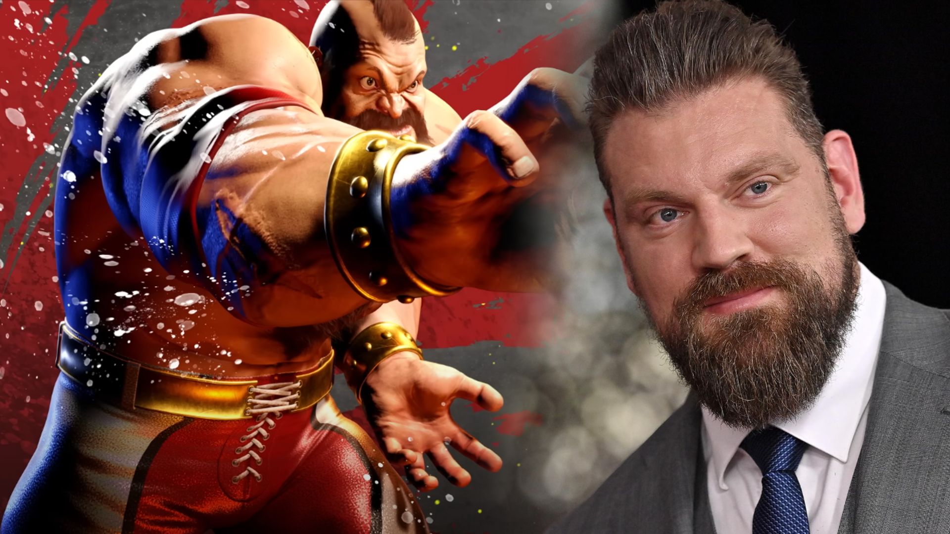 Bărbat de desene animate cu mohawk întinde mâna înainte, actorul Olivier Richters în costum gri în dreapta